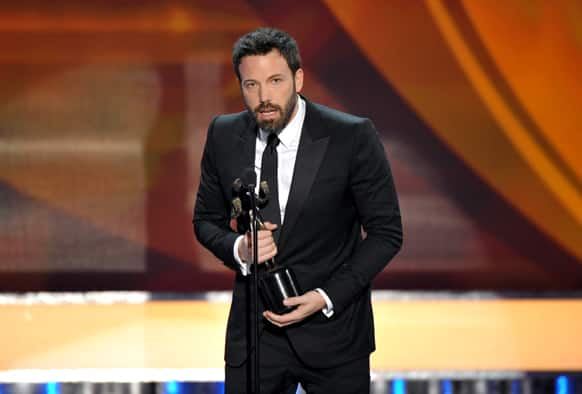 Ben Affleck accepts the award for outstanding cast in a motion picture for “Argo” at the 19th Annual Screen Actors Guild Awards at the Shrine Auditorium.