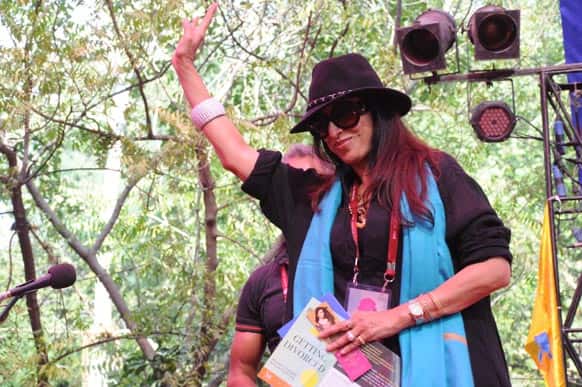 Shobhaa De waving to the crowd post finishing her session 'Celebrating Shobhaa'. She also launched Kareena Kapoor's 'The Style Diary of a Bollywood Diva' published under her imprint Shobhaa De books.