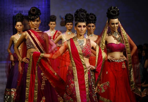 Models display creations by Ramesh Dembla at the Bangalore Fashion Week.