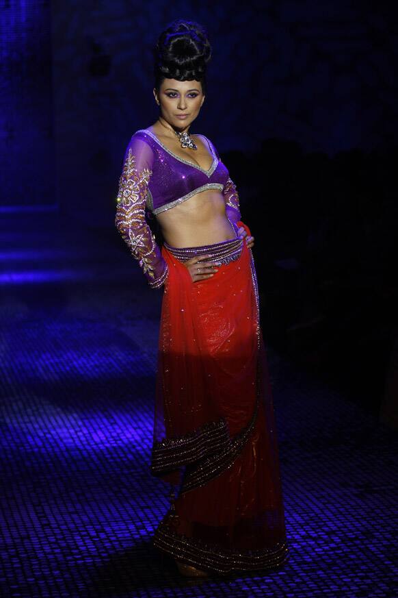 A model displays a creation by Ramesh Dembla at the Bangalore Fashion Week.