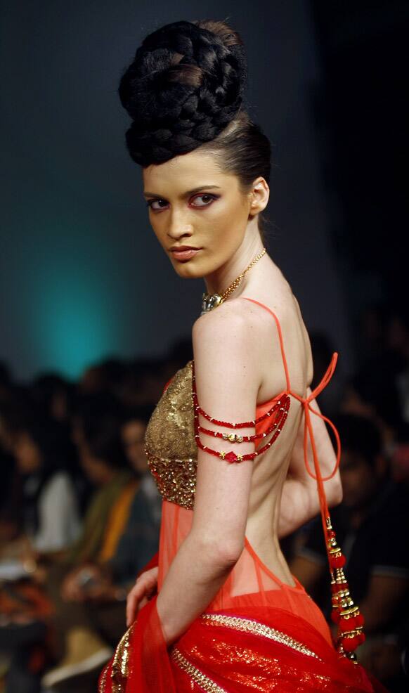 A model displays a creation by Ramesh Dembla at the Bangalore Fashion Week.