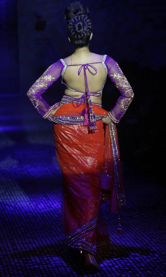 A model displays a creation by Ramesh Dembla at the Bangalore Fashion Week.