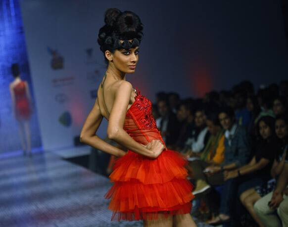 A model displays a creation by Ramesh Dembla at the Bangalore Fashion Week.