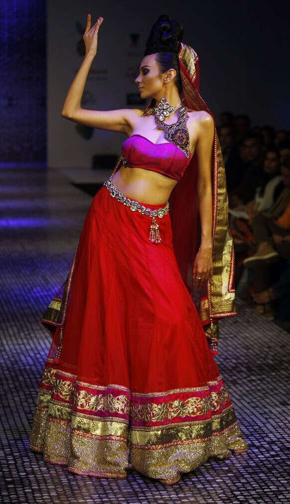 A model displays a creation by Ramesh Dembla at the Bangalore Fashion Week.