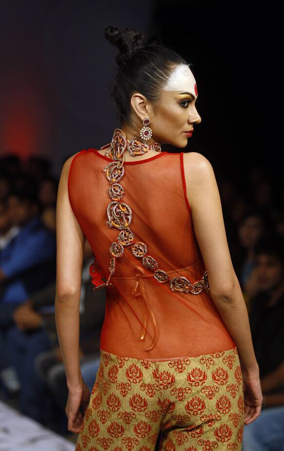 A model presents a creation by Abhishek Dutta at the Bangalore Fashion Week.