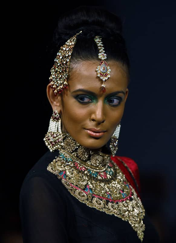 A model presents a creation by Neerus at the Bangalore Fashion Week.