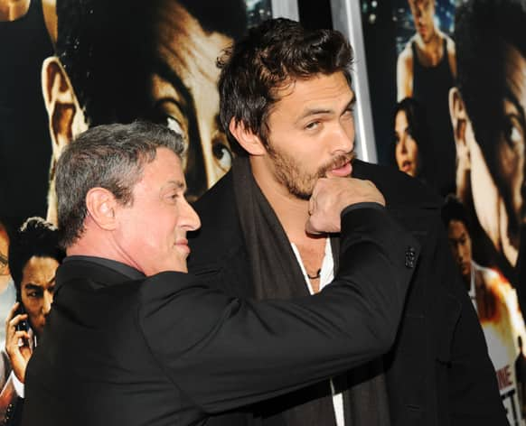 Actors Sylvester Stallone, left, and Jason Momoa attend the 