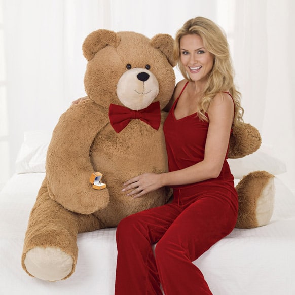 A model poses with the the Big Hunka Love Diamond Bear. The Shelburne, Vt.-based company has put a $30,000 price tag on the 4½-foot-tall bear. 