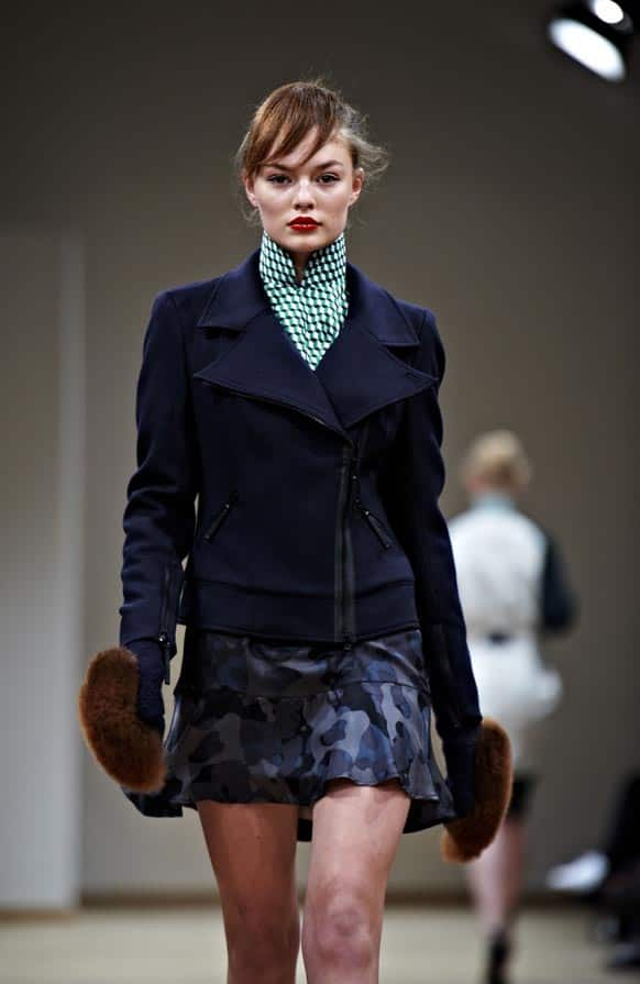 A model wears a design from the Danish Fashion house Baum und Pferdgarten, during the presentation of the Fall-Winther 2013 fashion collection at Charlottenborg Art Hall in Copenhagen, Denmark.