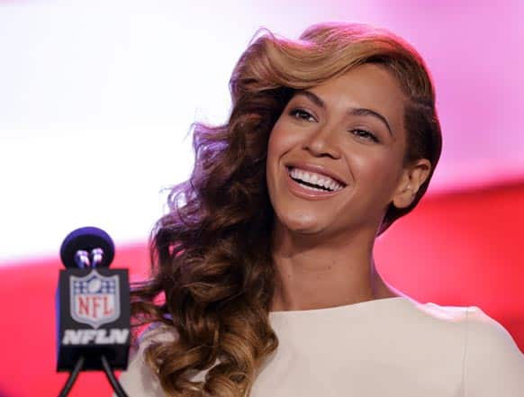 Beyoncé speaks during a news conference, in New Orleans. Beyoncé is scheduled to perform during halftime of the NFL Super Bowl XLVII football game.