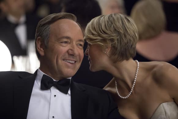 This image released by Netflix shows Kevin Spacey as U.S. Congressman Frank Underwood, left, and Robin Wright as Claire Underwood in a scene from the Netflix original series,