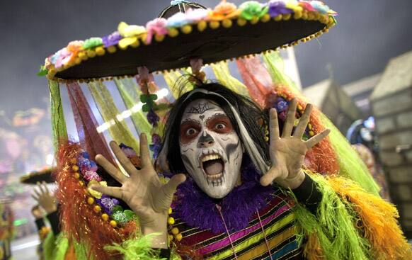 A dancer from the Rosas de Ouro samba school performs during a carnival parade in Sao Paulo, Brazil.