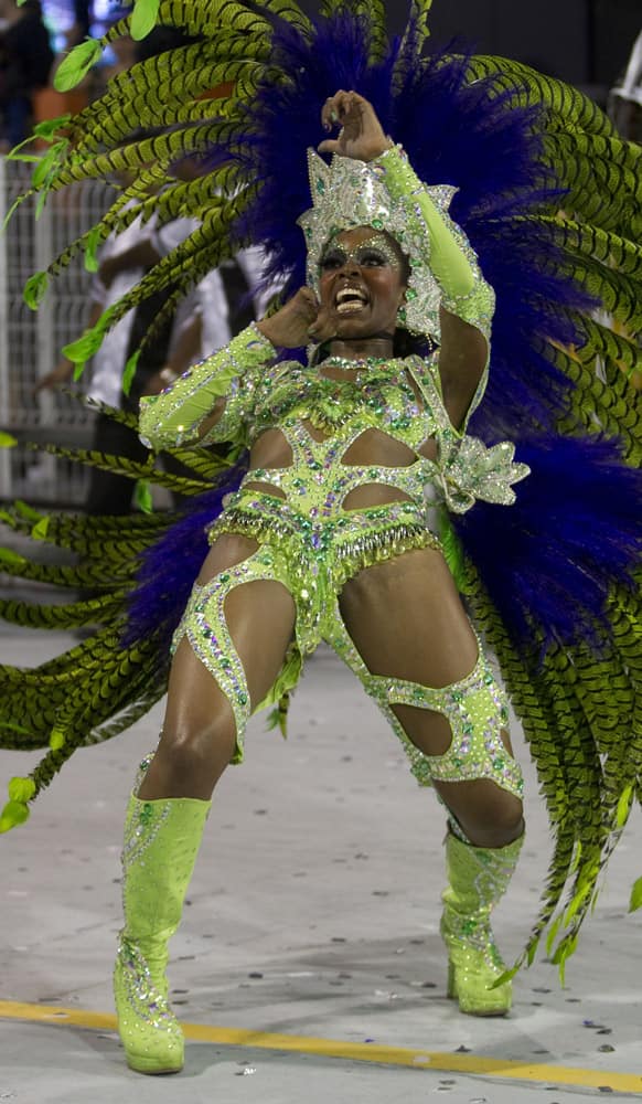 A dancer from the Vai-Vai samba school performs during a carnival parade in Sao Paulo, Brazil.