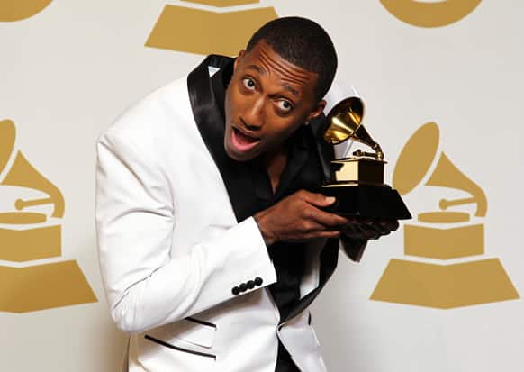 LeCrae poses backstage with the best gospel album award for
