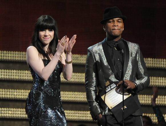 Carly Rae Jepsen, left, and Ne-Yo present the award for best rap/sung collaboration at the 55th annual Grammy Awards.