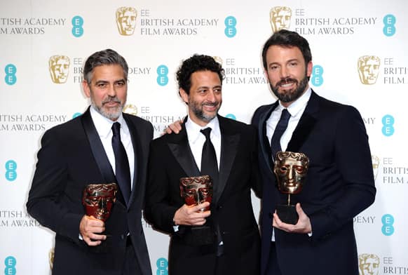 American actors George Clooney, Grant Heslov, and Ben Affleck pose with the award for Best Film, for