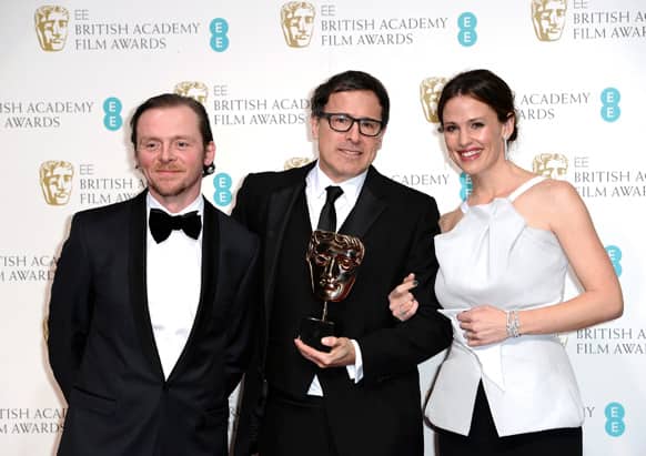 British actor Simon Pegg, left, American director David O. Russell with his award for Adapted Screenplay for