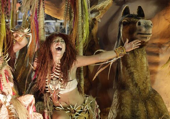 A performer from the Beija Flor samba school parades during carnival celebrations at the Sambadrome in Rio de Janeiro.