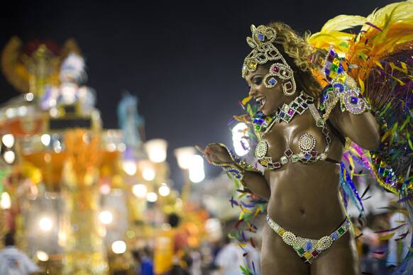 A performer from the Beija Flor samba school parades during carnival celebrations at the Sambadrome in Rio de Janeiro.