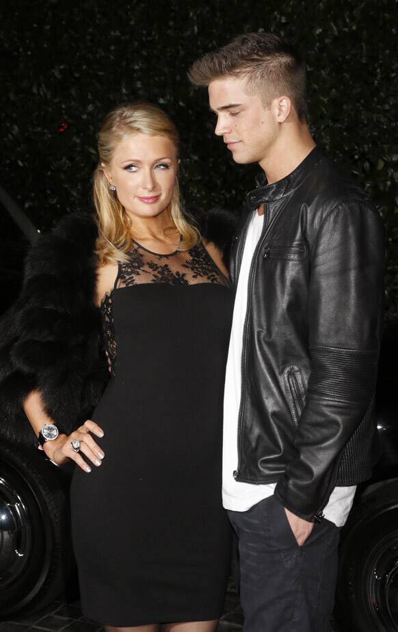 Paris Hilton and River Viiperi attend the Topshop Topman LA Opening Party At Cecconi's in Los Angeles.