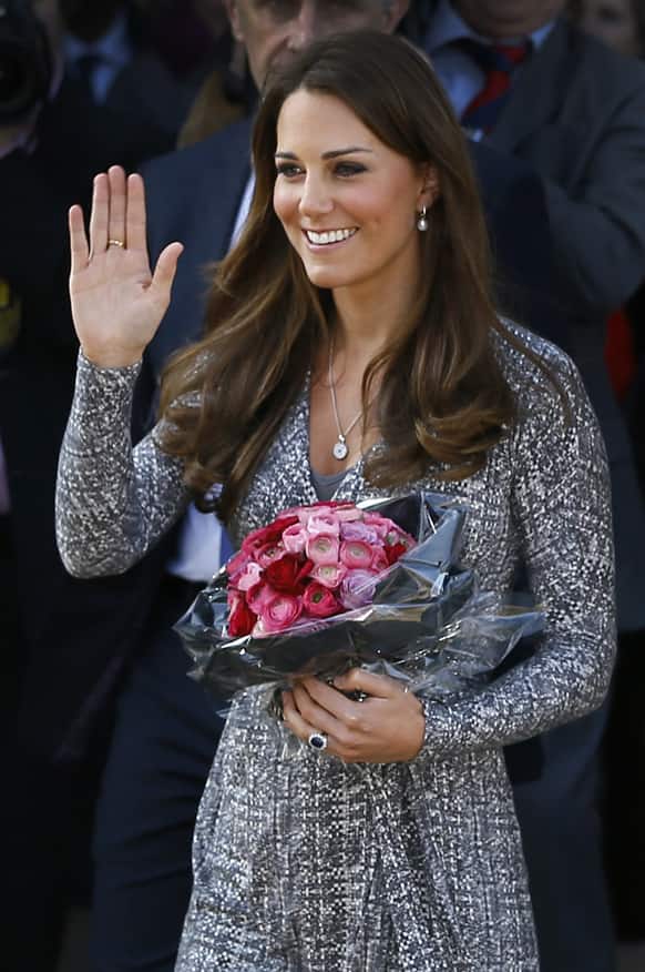 Britain's Kate, The Duchess of Cambridge waves as she leaves after a visit to Hope House, in London.