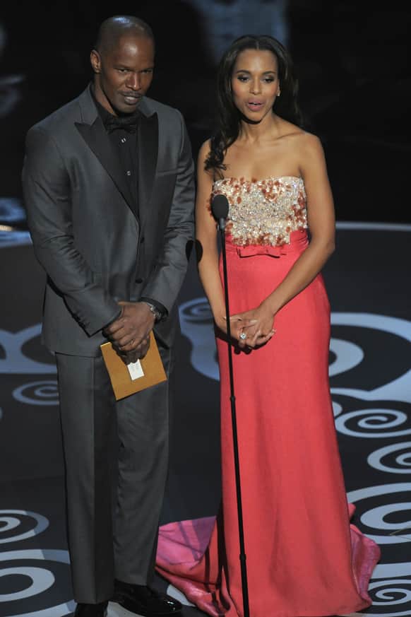 Actors Jamie Foxx, left, and Kerry Washington present an award during the Oscars at the Dolby Theatre.