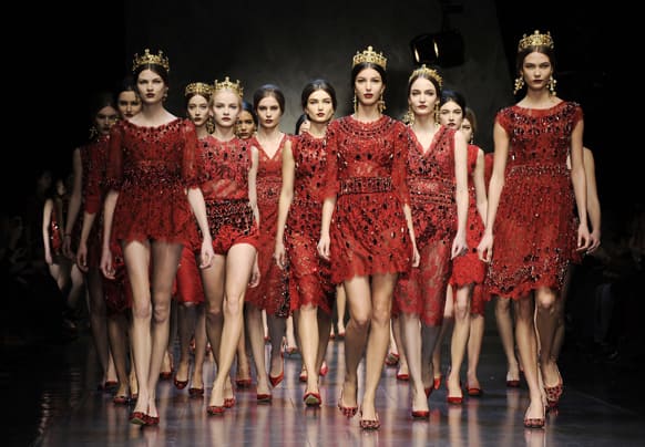 Models wear creations for Dolce & Gabbana women's Fall-Winter 2013-14 collection, part of the Milan Fashion Week.