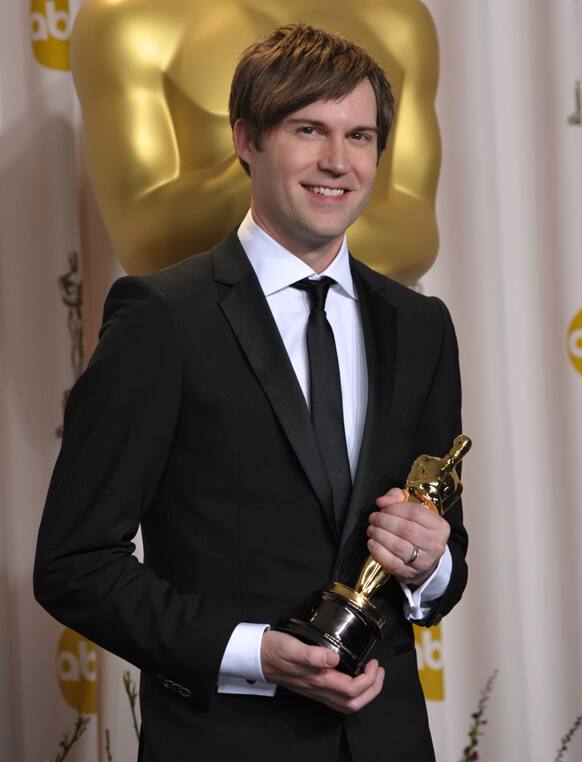 Writer Shawn Christensen poses with his award for best live action short film for