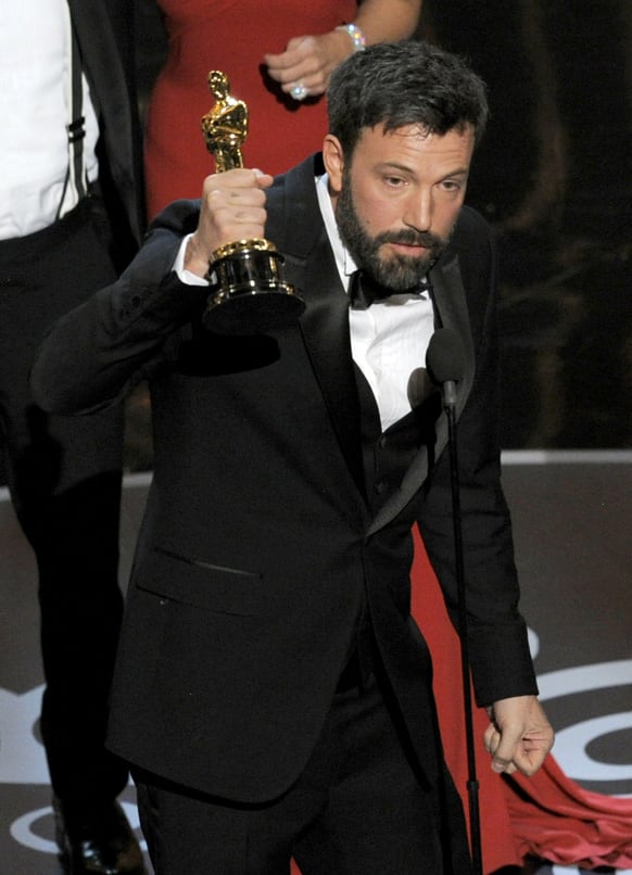 Director/producer Ben Affleck accepts the award for best picture for