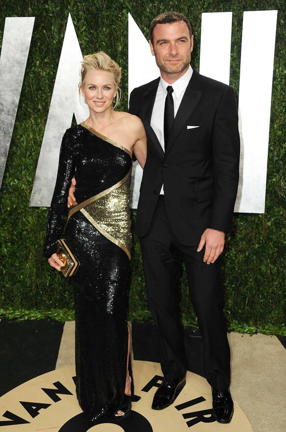 Actress Naomi Watts, left, and actor Liev Schreiber arrive at the 2013 Vanity Fair Oscar party, at the Sunset Plaza Hotel in West Hollywood.