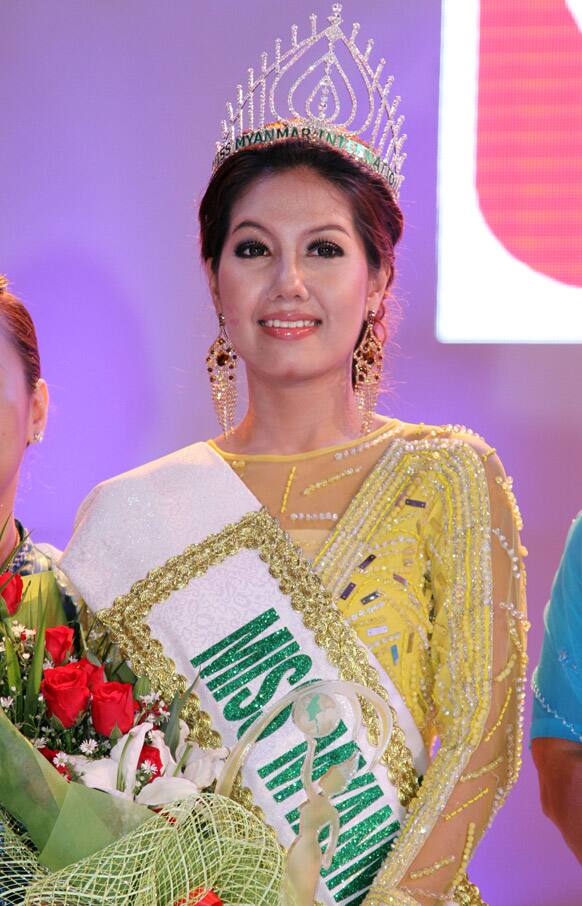 Miss Myanmar International winner Gonyi Aye Kyaw smiles after being crowned in Miss Myanmar International competition at Myanmar Convention Center in Yangon, Myanmar.