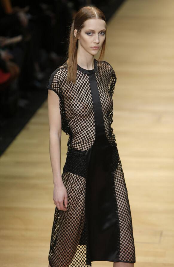 A model presents a creation by French-Swedish fashion designer Marcel Marongiu for Guy Laroche's Ready to Wear's Fall-Winter 2013-2014 fashion collection, presented in Paris.