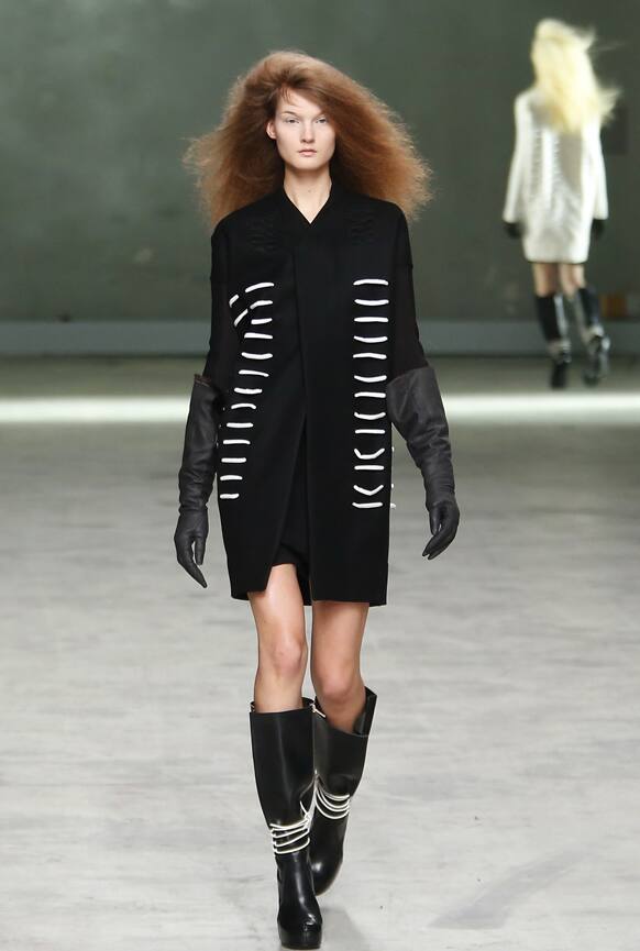 Model wear creations by US fashion designer Rick Owens for his Ready to Wear Fall-Winter 2013-2014 fashion collection, presented, in Paris.