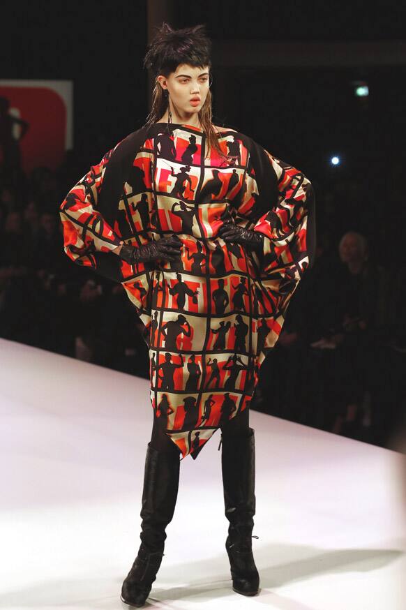 A model wears a creation by French fashion designer Jean-Paul Gaultier as part of his Ready to Wear Fall-Winter 2013-2014 fashion collection, presented in Paris.