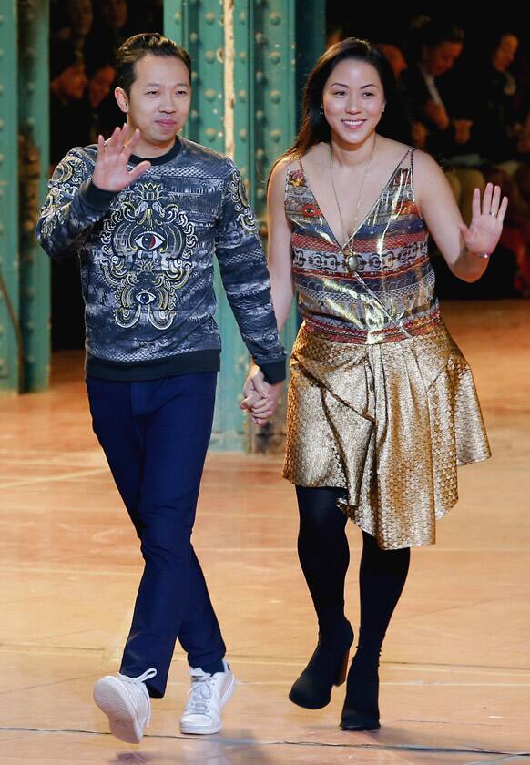 Fashion designers Humberto Leon, left, from Peru, and Carol Lim, from South Korea for Kenzo Ready to Wear Fall-Winter 2013-2014 fashion collection, presented, in Paris.