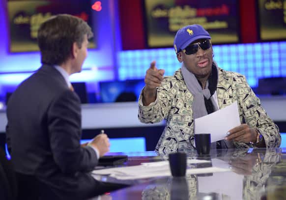Host George Stephanopoulos, left, interviews former NBA star Dennis Rodman, just back from a visit with North Korea's young leader Kim Jong Un, in studio in New York.