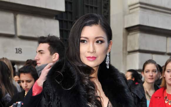 Producer Rebecca Wang seen arriving for John Galliano's Ready to Wear Fall-Winter 2013-2014 fashion collection at Paris Fashion week.