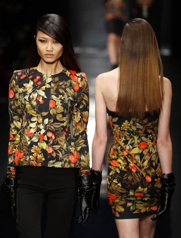 A model presents a creation for French fashion house Leonard's Ready to Wear's Fall-Winter 2013-2014 fashion collection presented in Paris.
