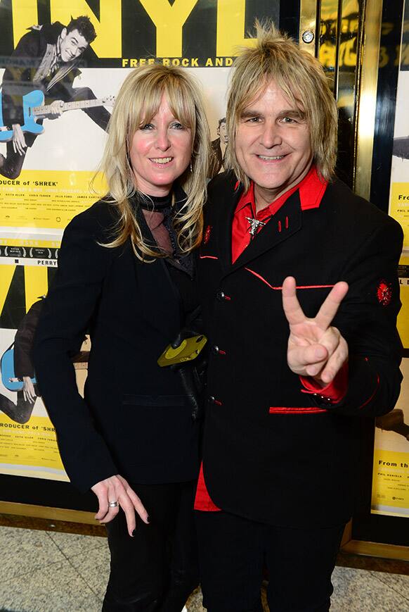 Mike Peters, right, stands with Jules Peters at the UK Gala Screening of Vinyl at the Empire Leicester Square in London.