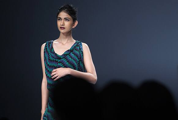 A model displays a creation by Surily Goel during the Wills Lifestyle India Fashion Week in New Delhi.