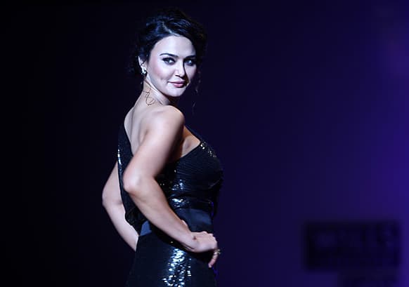 Bollywood actor Preity Zinta displays a creation by Surily Goel during the Wills Lifestyle India Fashion Week in New Delhi.