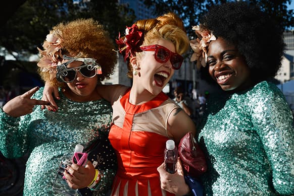 English singer-songwriter Paloma Faith, center, poses with her backing singers Naomi Miller, left, and Miss Baby Sol, during the South By South West music festival, in Austin, Texas.