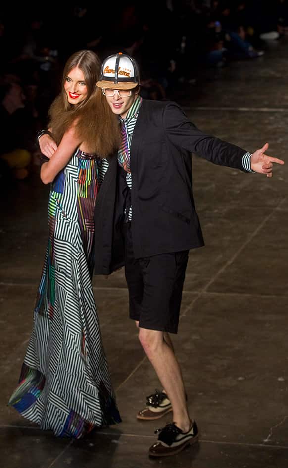 Models present creations from the Cavalera summer collection during the Sao Paulo Fashion Week.
