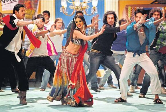Here's the first look of Sunny Leone's desi item number, 'Laila', from the film 'Shootout At Wadala'. The 'Jism 2' sensation is seen here with John Abraham and Tusshar Kapoor.