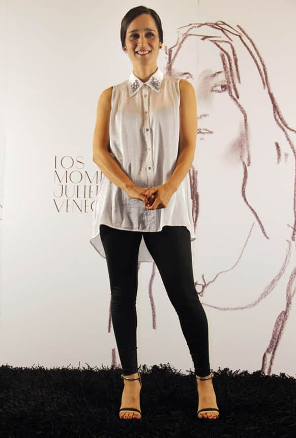 Julieta Venegas poses for photographers at an event promoting her latest album in Mexico City.