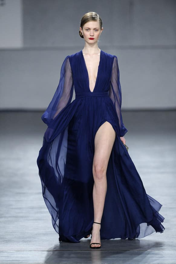 A model displays a creation by Portuguese designer Diogo Miranda during the Portugal Fashion Fall/Winter 2013/14 week.