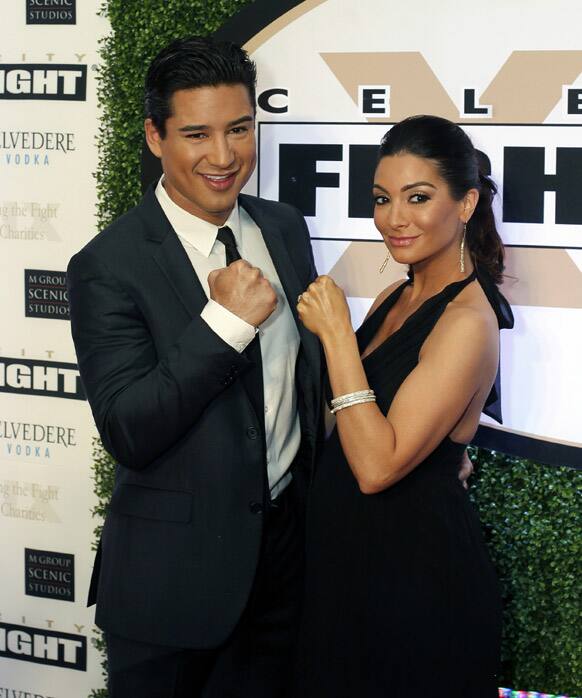 Actor Mario Lopez and wife Courtney arrive at Muhammad Ali's Celebrity Fight Night XIX at the JW Marriott Desert Ridge Resort and Spa, in Phoenix.