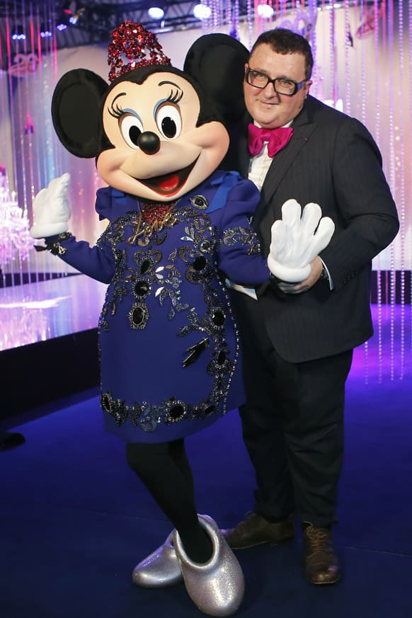 Israeli fashion designer Alber Elbaz poses with Minnie wearing a dress by Lanvin fashion house and designed by Alber Elbaz, at the Eurodisney Parc, in Marne la Vallee, east of Paris.