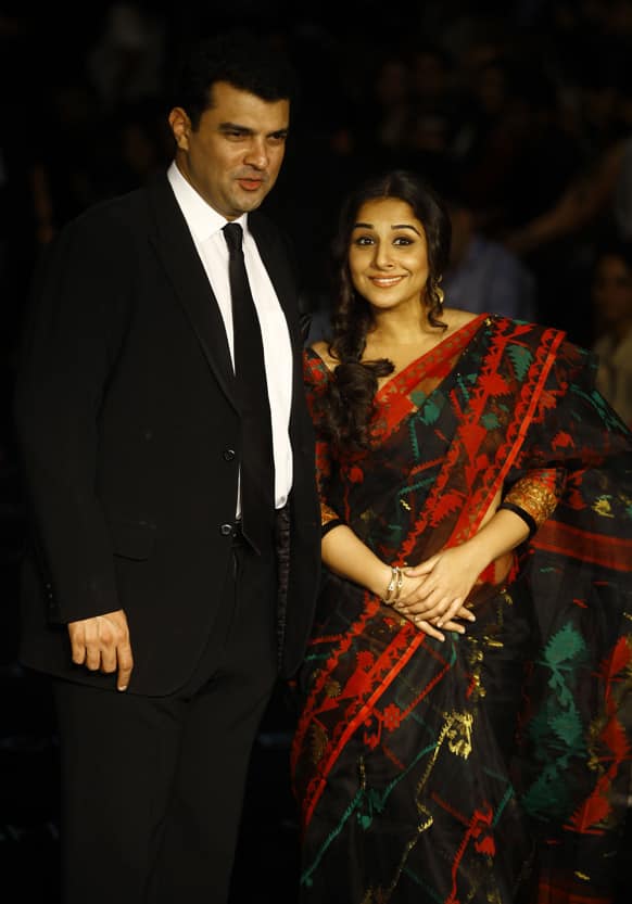 Bollywood actress Vidya Balan attends the Lakme Fashion Week with her husband Siddharth Roy Kapur in Mumbai.