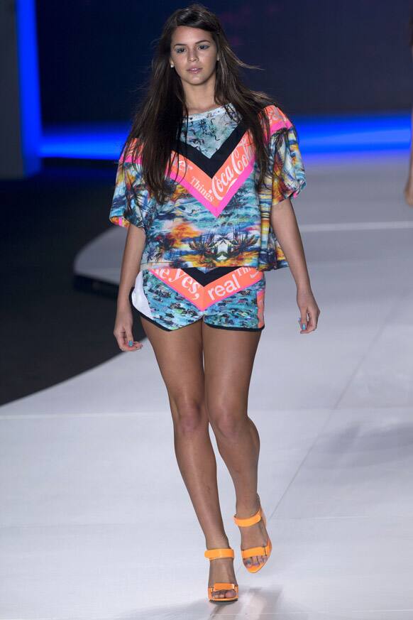 Bruna Marquezine, actress and girlfriend of Brazilian soccer player Neymar, wears a creation from the Coca-Cola Clothing summer collection at Fashion Rio, in Rio de Janeiro, Brazil.
